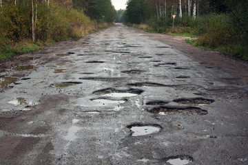 potholes need to be inspected and repaired at least once a year if they are dangerous